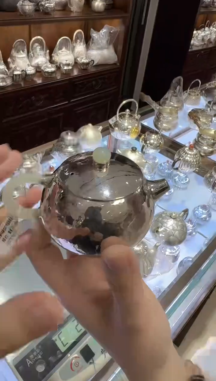 【闪购商品】足银999玉把锤纹亮面西施泡茶壶