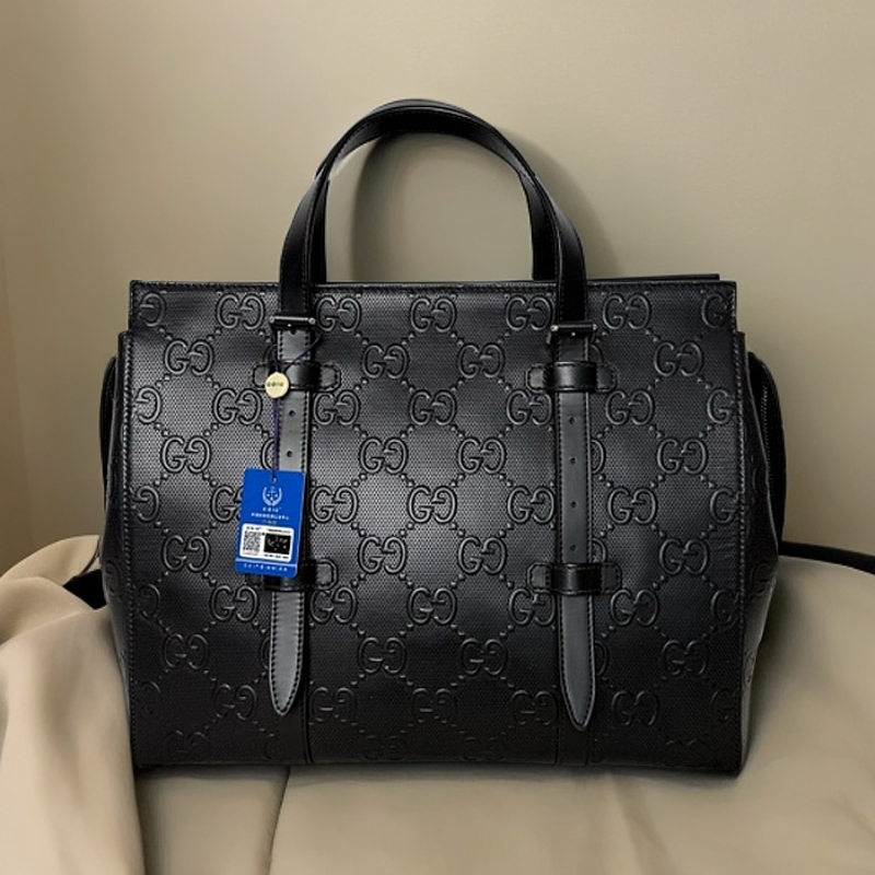 99新 GUCCI/古驰 4768/时尚休闲黑色全皮压纹手提包