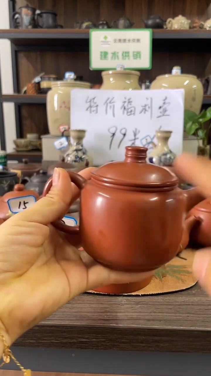 。**喵建水紫陶复烧素壶1