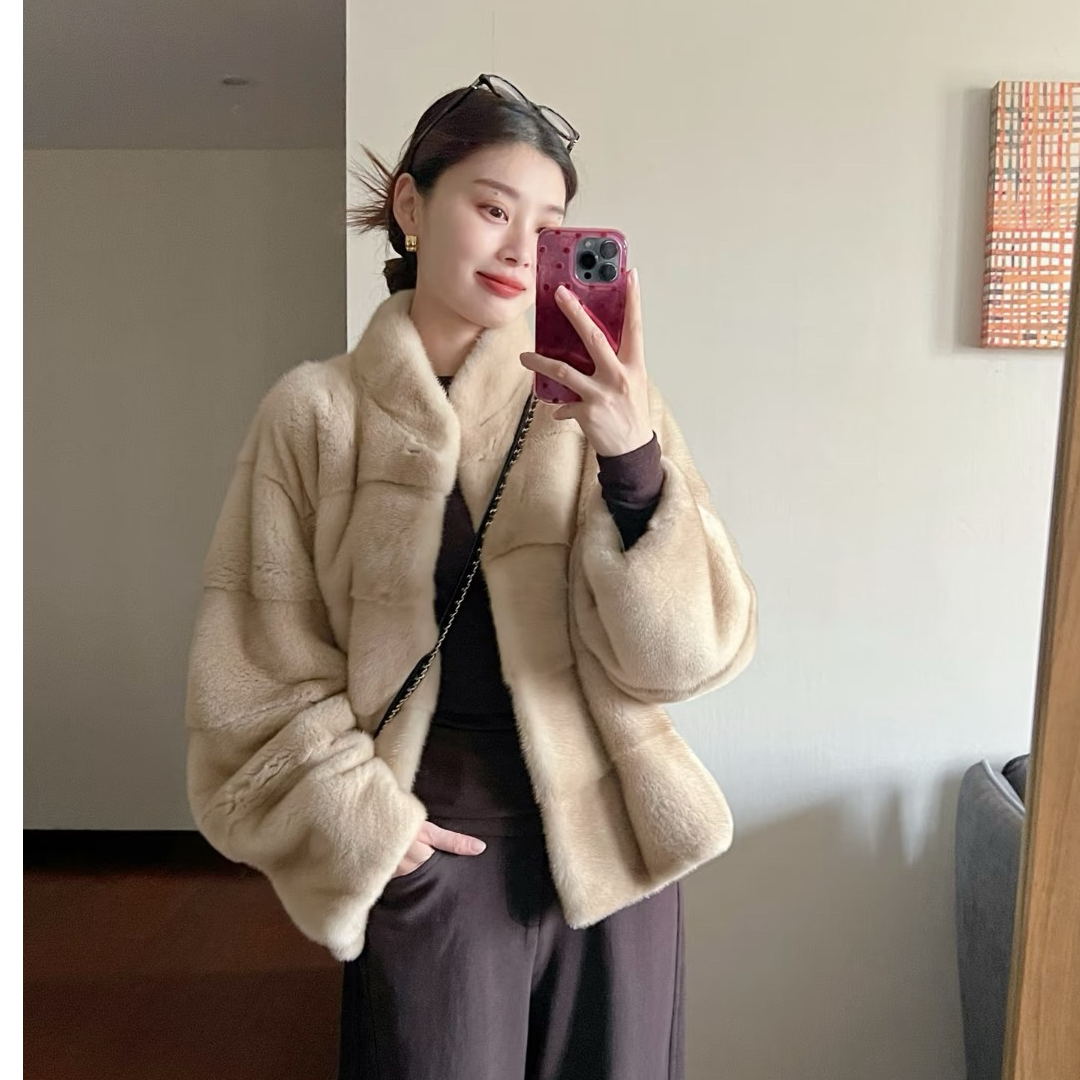 2025年新款曼城故事立领横排塔式微弧袖脊子靠坎水貂皮草女新款