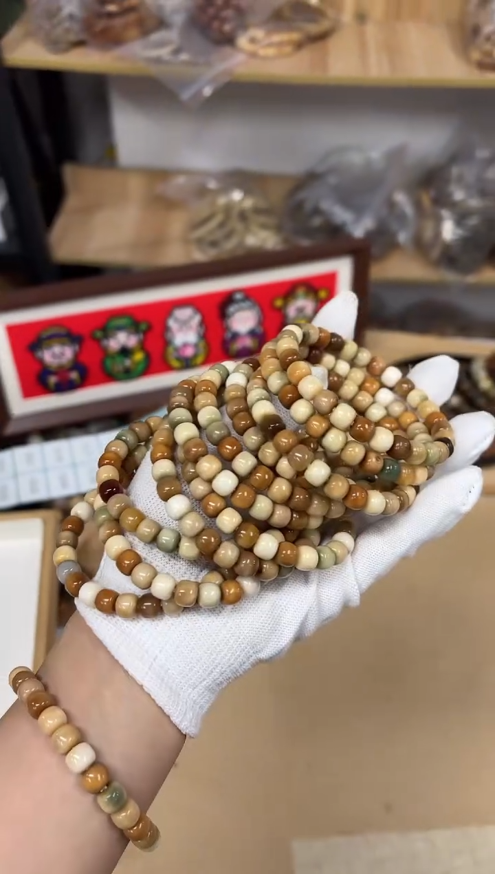 手串菩提根/象牙果0.8龙脊（314）