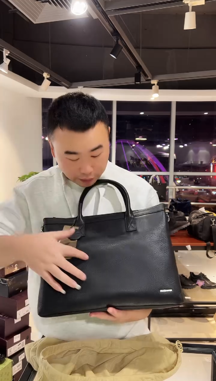 头层牛皮韩爵绅士包包皮具712