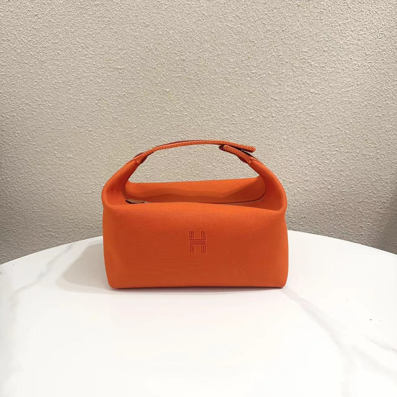 99新  蔚蓝/Hermes 爱马仕/爱马仕橙 帆布 手提饭盒包/超难买