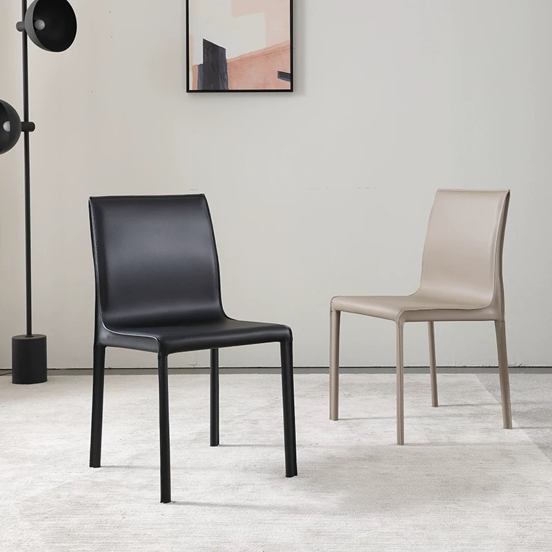 意式极简马鞍皮餐椅家用靠背餐厅皮椅北欧酒店设计师网红简约椅子