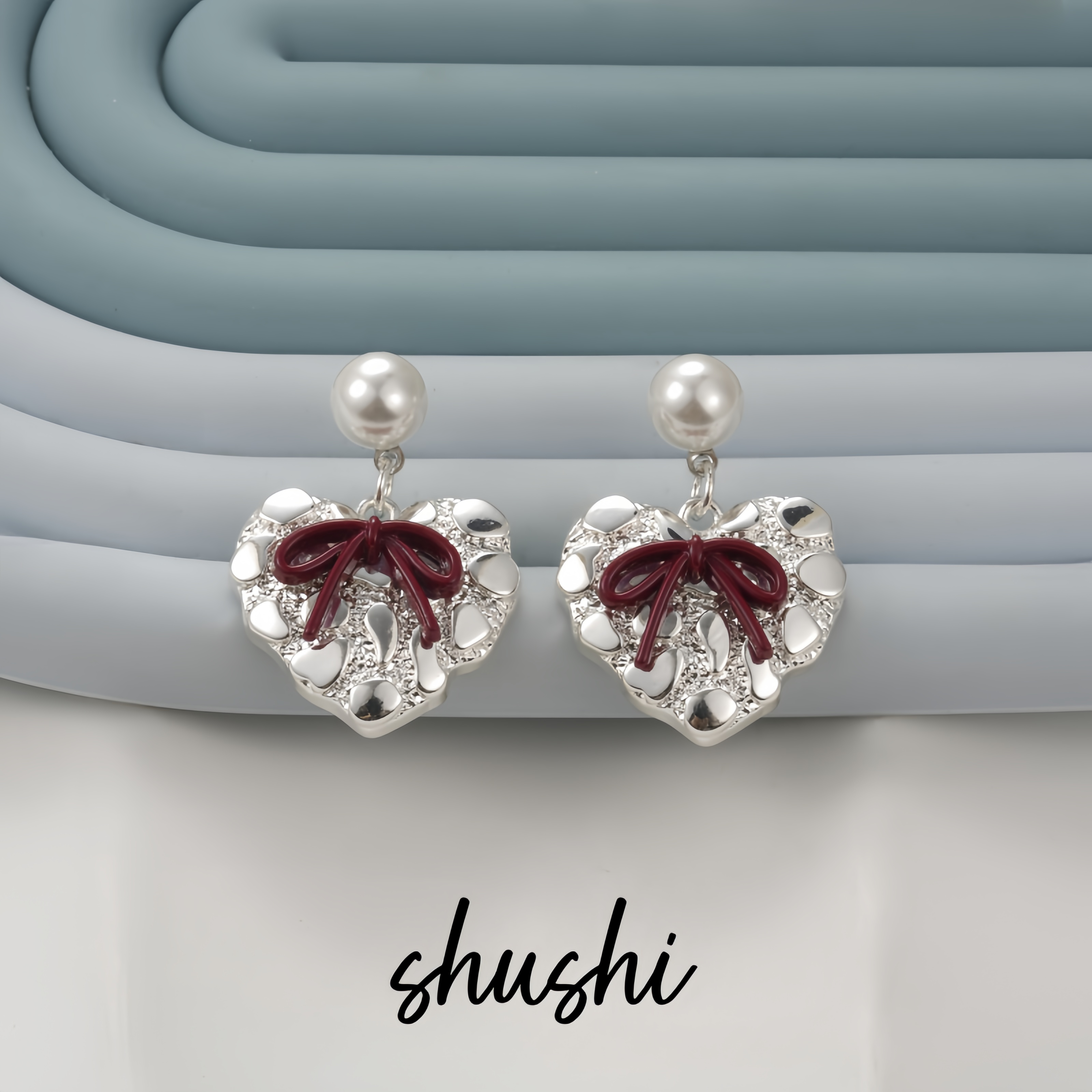 铜合金仿珍珠耳饰 时尚百搭轻奢气质蝴蝶结经典耳环7070