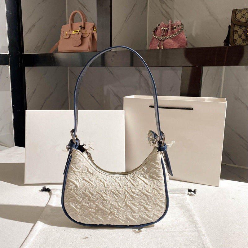 香港MACK高级感今年流行褶皱包包女夏小众设计月牙包腋下包单肩