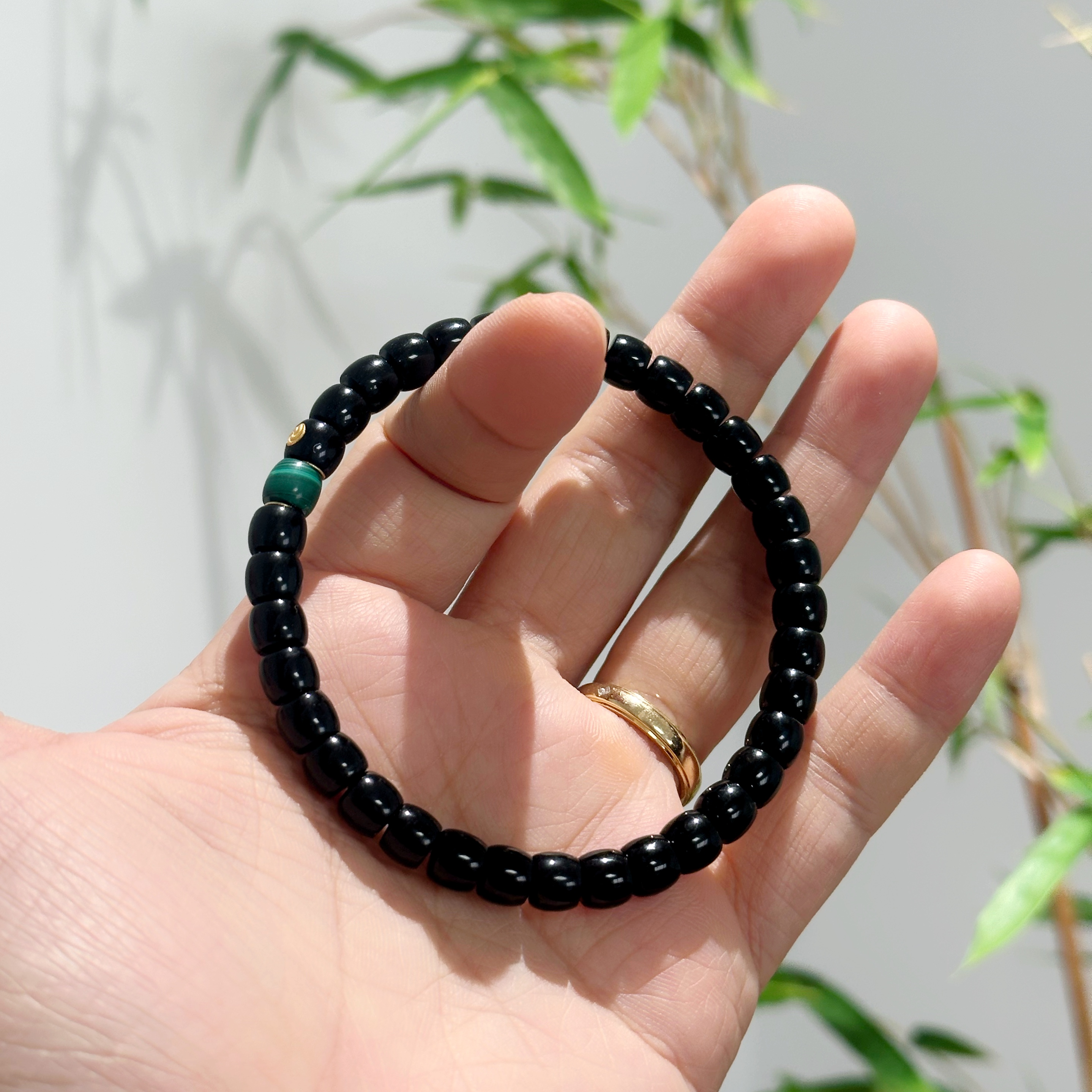 XT0428禧樘墨染系列禧旋直切手串6.4mm