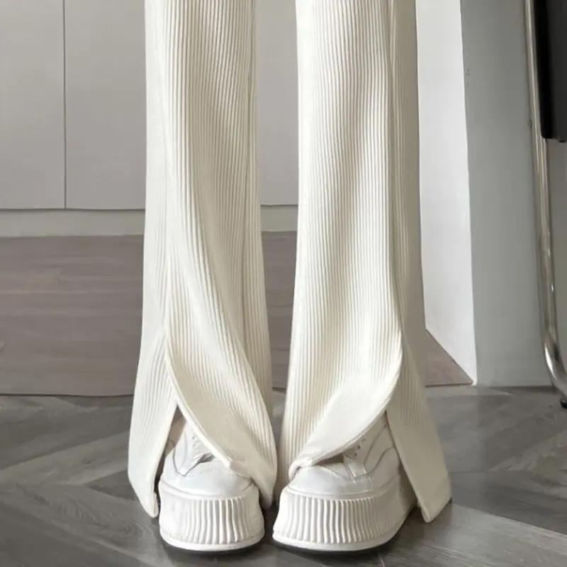 白色灯芯绒裤子女秋冬加绒雪尼尔阔腿裤高腰垂感休闲开叉微喇叭裤