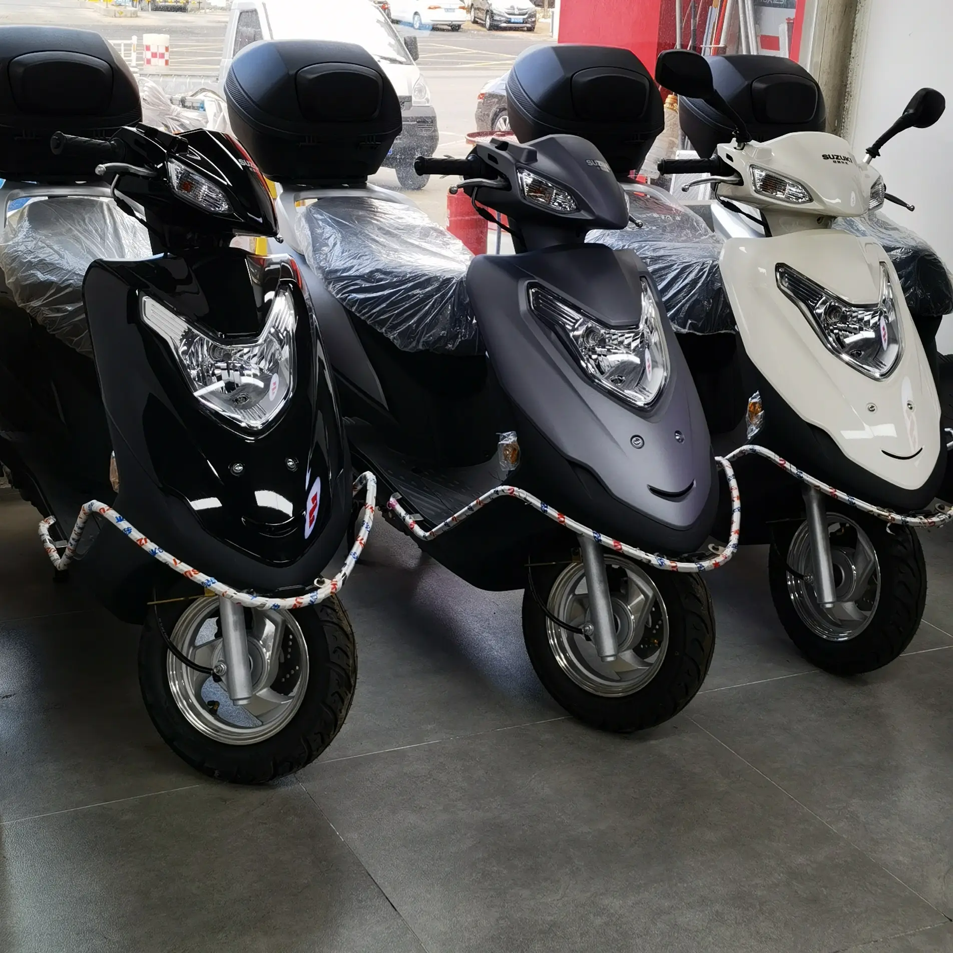 特价铃木丽梦125碟刹尾箱护杠版