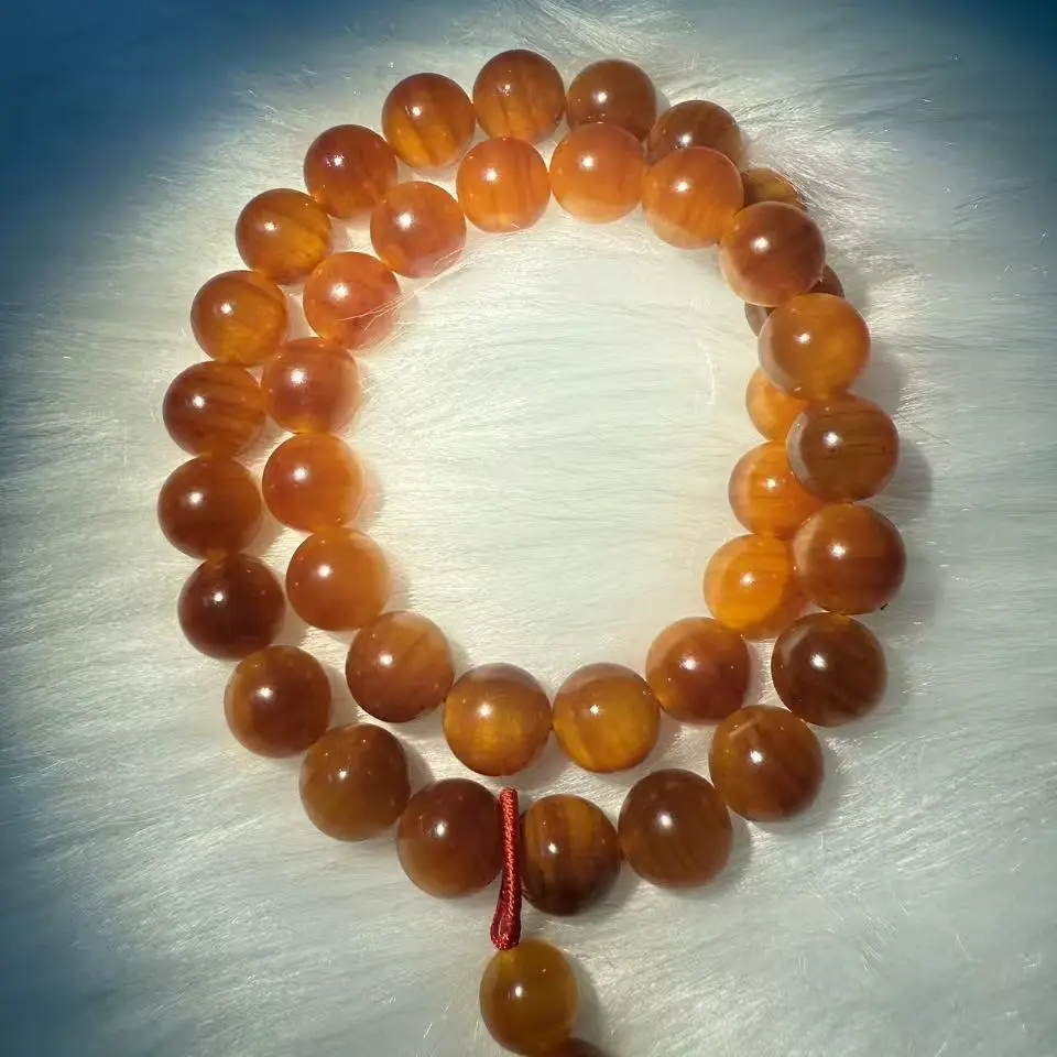 1.1X38颗，双圈包浆款满油全透松木、血龙木手串