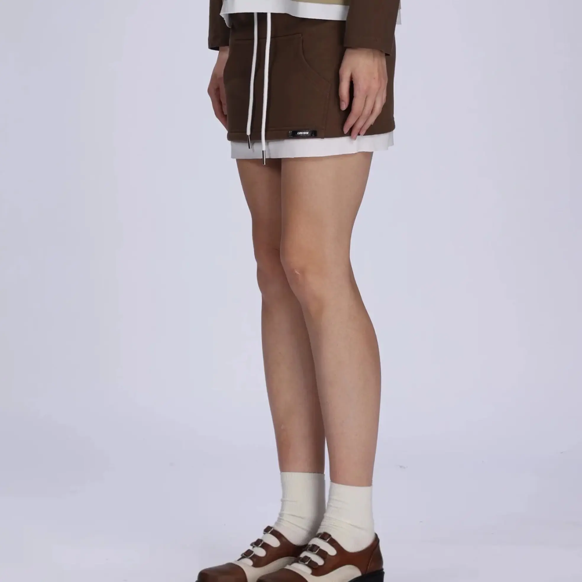 LACERTA 25秋季口袋解构休闲半身裙抽绳运动包臀短裙