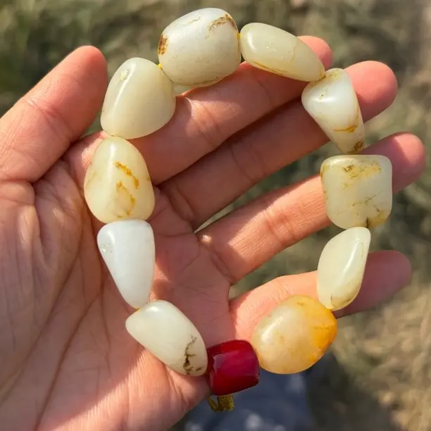 天然和田玉手串籽型饱满枣红皮手工精雕