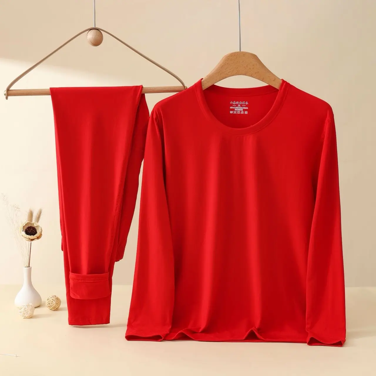 秋冬本命年情侣大红色发热保暖内衣皮肤衣套装打底