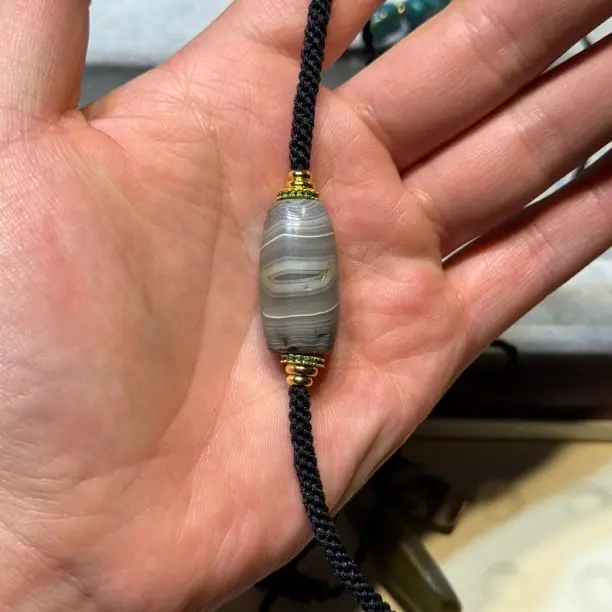 非金属玻璃吊坠 勒子橄榄型金黄沁  