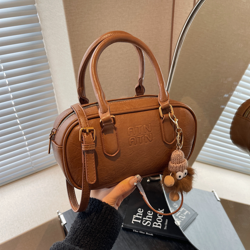 韩版手提保龄球包包女2025春新款高级感复古小方包小众单肩斜挎包